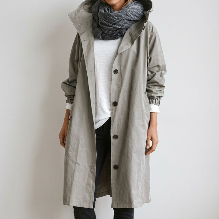 Women's long hooded trench coat with button front and elastic cuffs