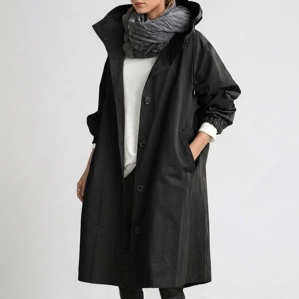 Women's long hooded trench coat with button front and elastic cuffs