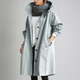 Women's long hooded trench coat with button front and elastic cuffs