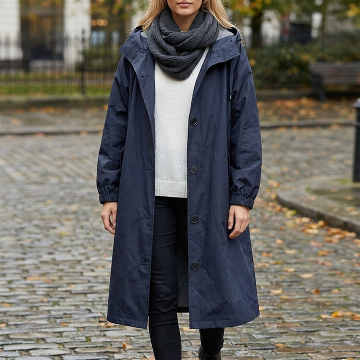 Women's long hooded trench coat with button front and elastic cuffs