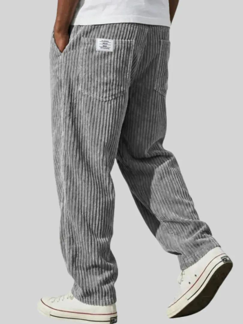 Corduroy trousers with ribbed texture and front pockets