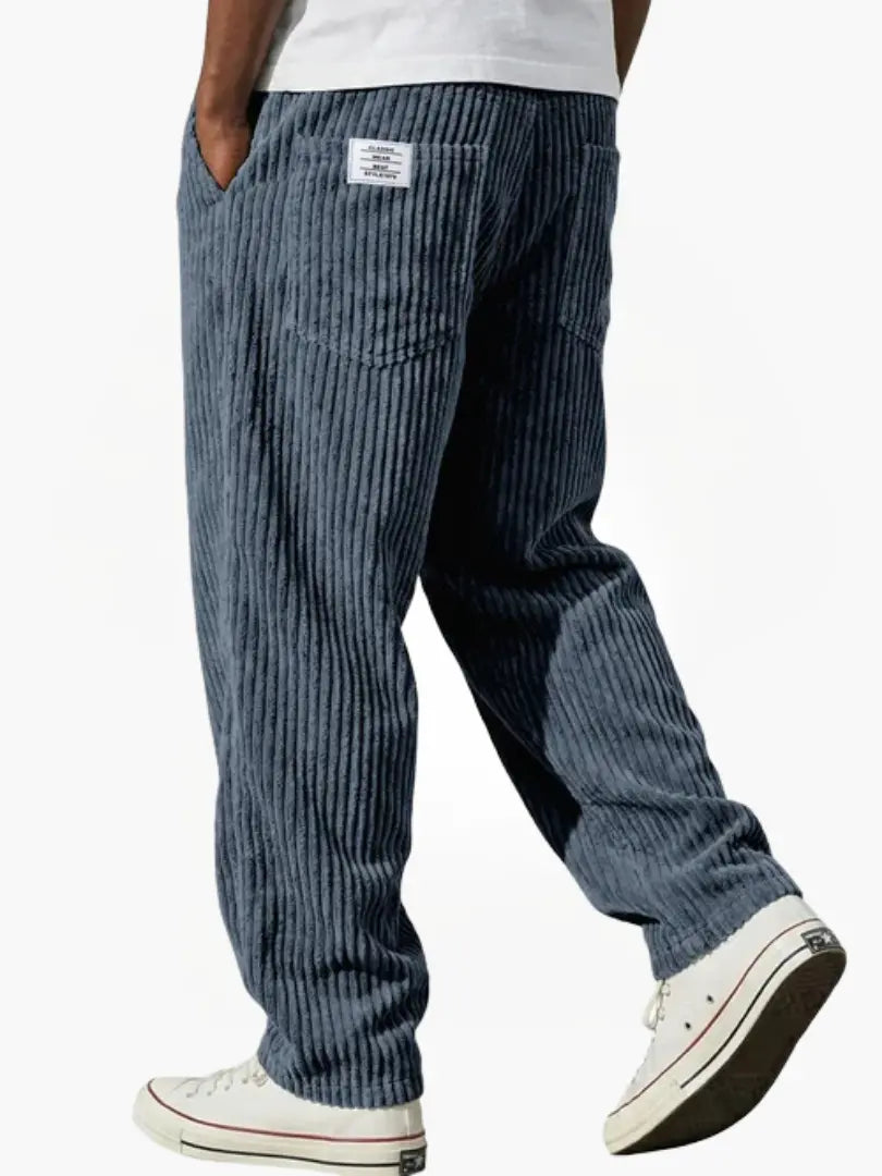 Corduroy trousers with ribbed texture and front pockets