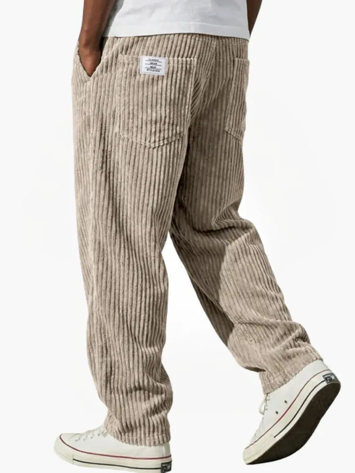 Corduroy trousers with ribbed texture and front pockets