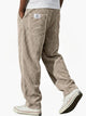 Corduroy trousers with ribbed texture and front pockets