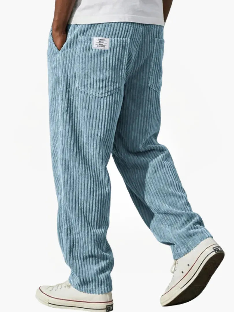 Corduroy trousers with ribbed texture and front pockets