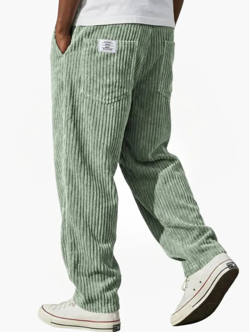 Corduroy trousers with ribbed texture and front pockets