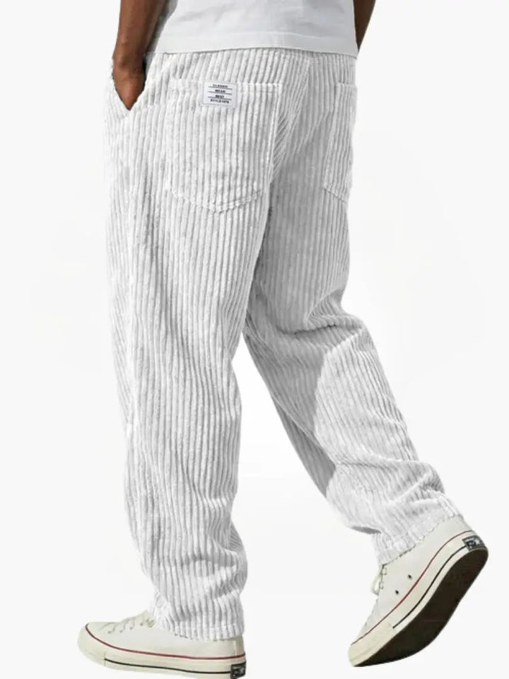 Corduroy trousers with ribbed texture and front pockets
