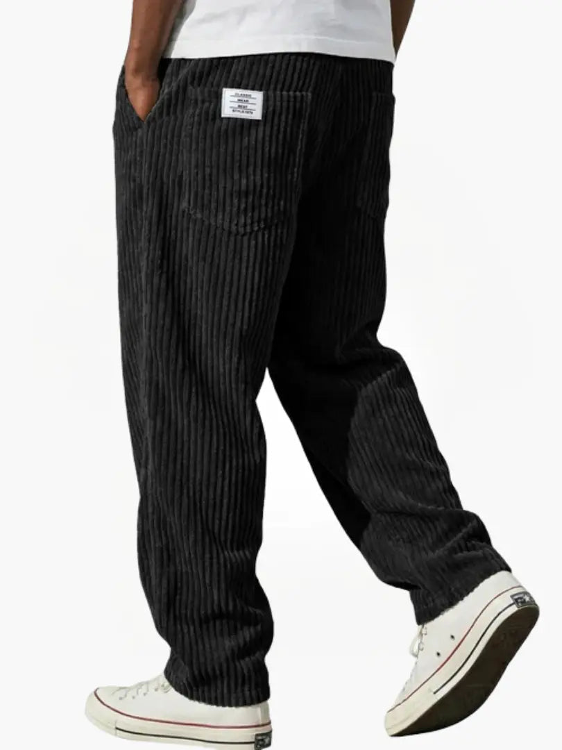 Corduroy trousers with ribbed texture and front pockets
