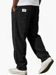 Corduroy trousers with ribbed texture and front pockets
