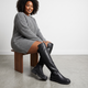 Women's black knee-high boots with round toes and low block heels