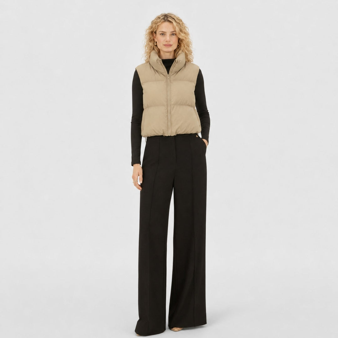 Women's cropped quilted puffer vest with high collar and front zipper