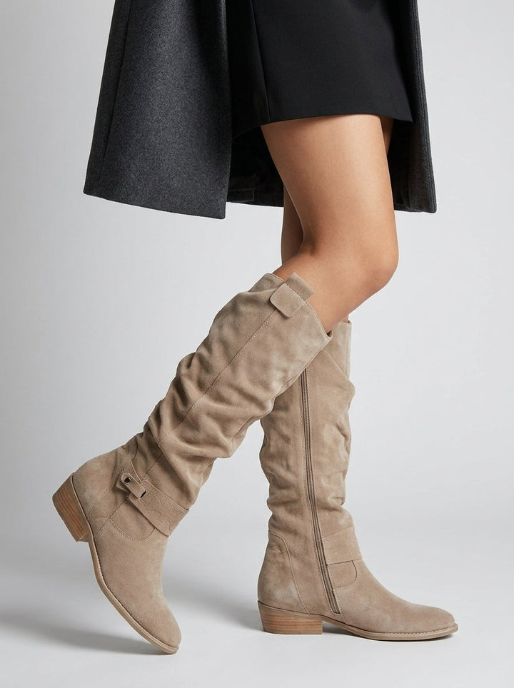 Women's knee high slouchy boots with buckle detail and low heel