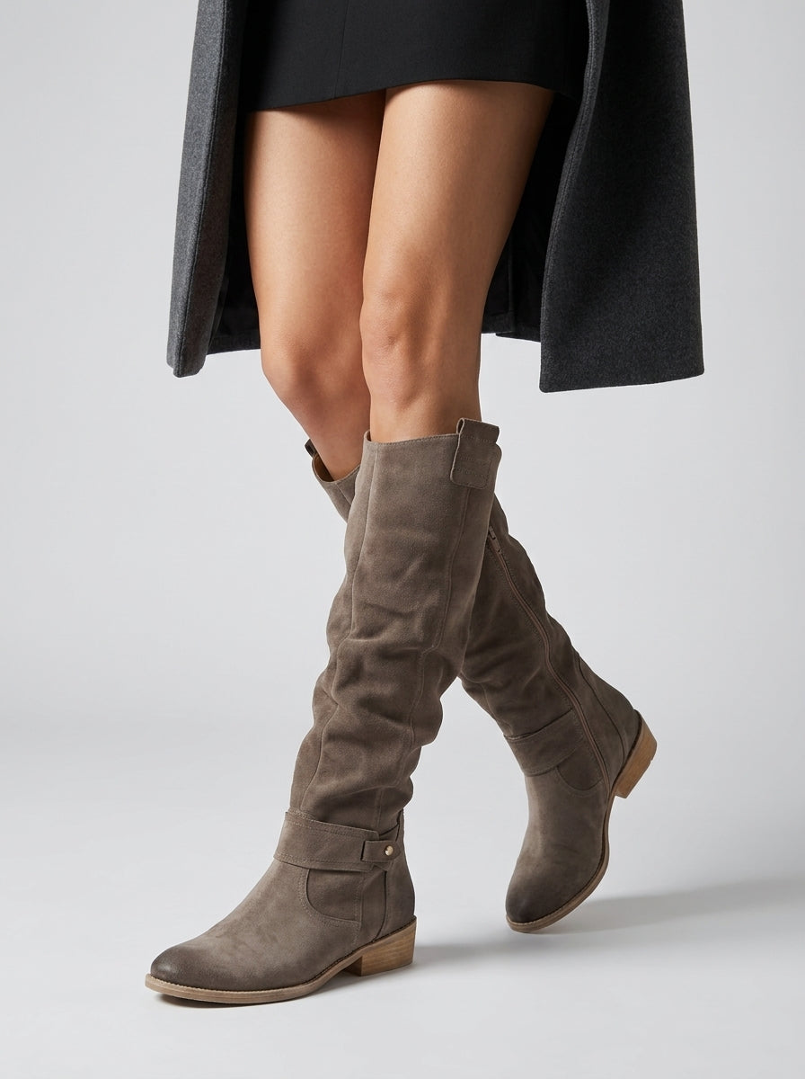 Women's knee high slouchy boots with buckle detail and low heel