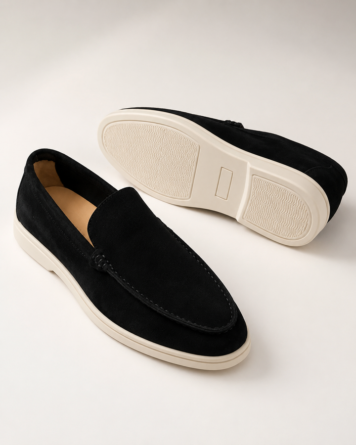 Men's slip-on loafers with rounded toes, stitched apron trim and flat light soles