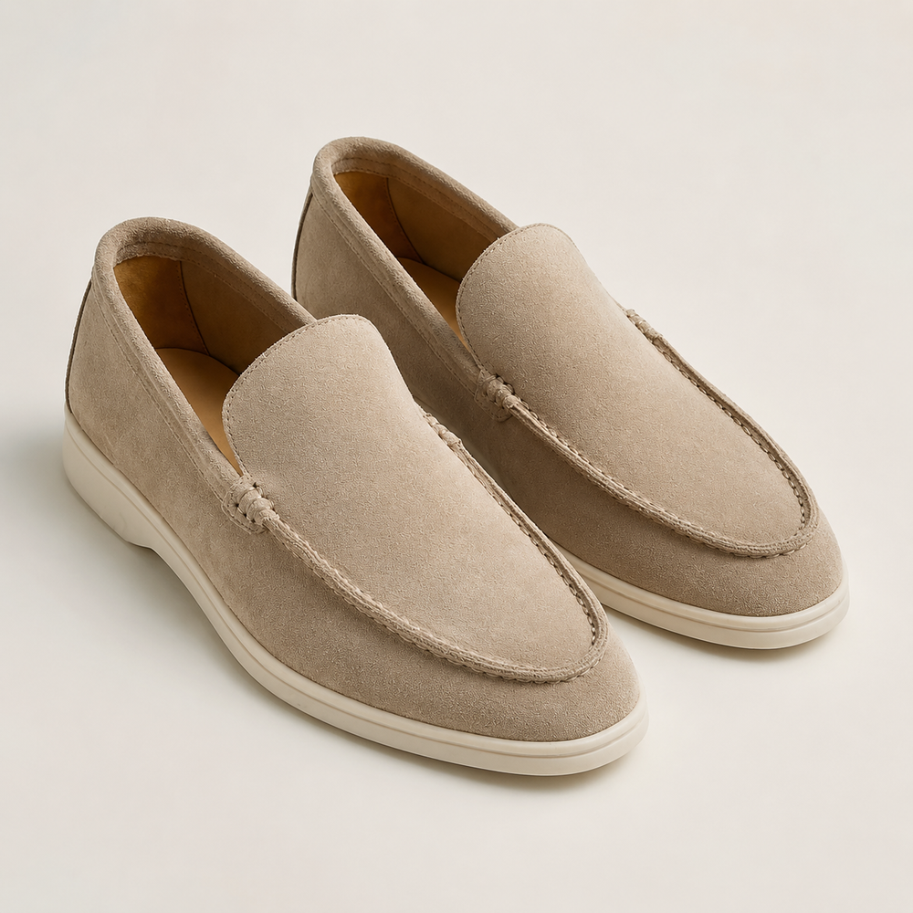 Men's slip-on loafers with rounded toes, stitched apron trim and flat light soles