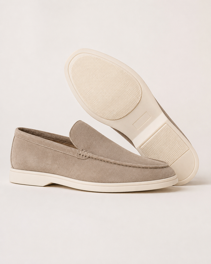 Men's slip-on loafers with rounded toes, stitched apron trim and flat light soles