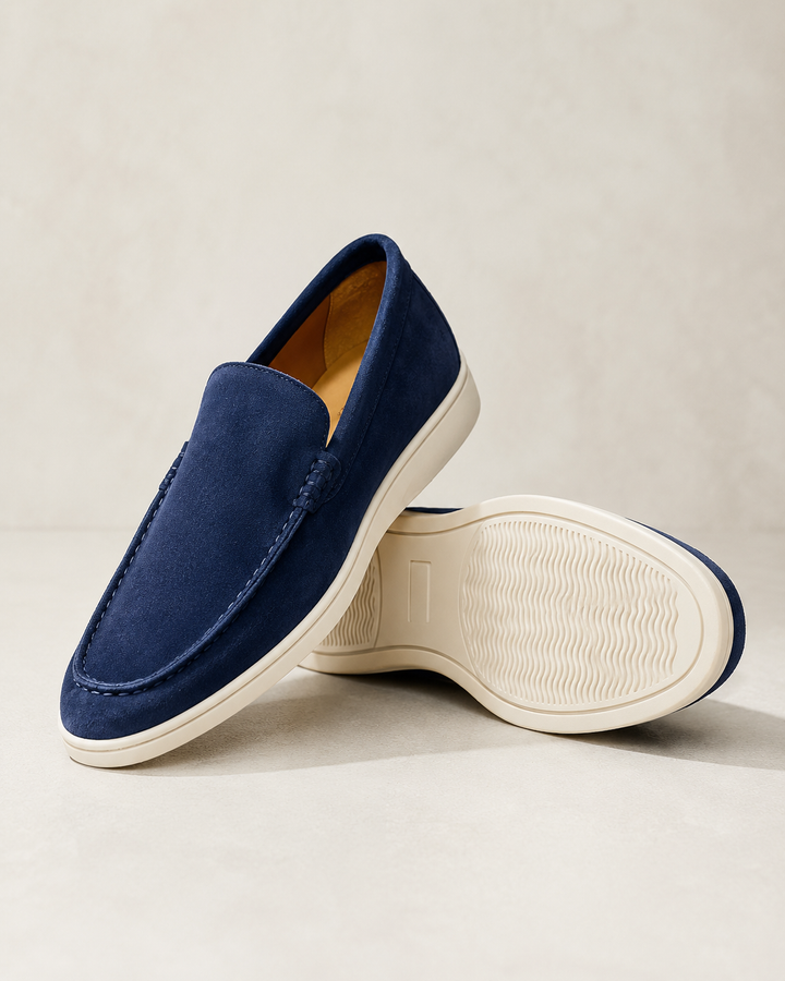 Men's slip-on loafers with rounded toes, stitched apron trim and flat light soles