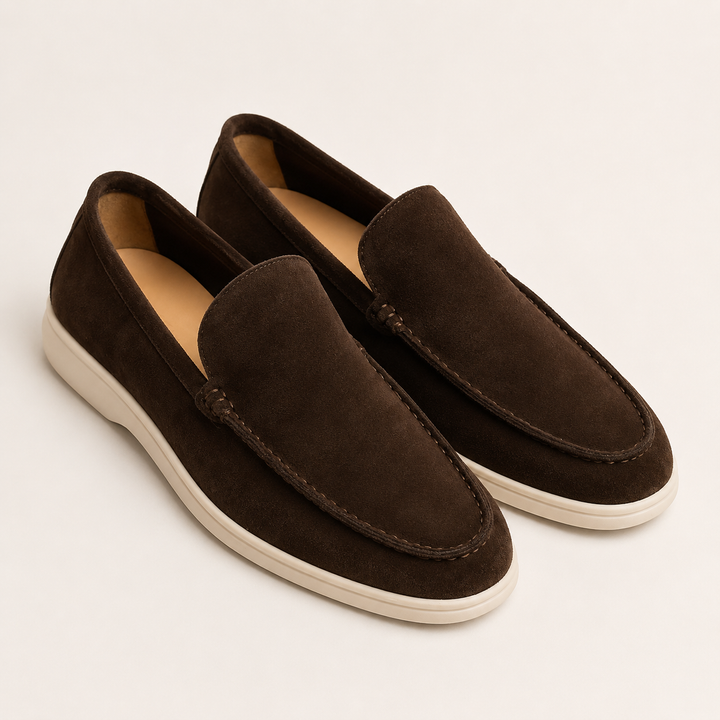 Men's slip-on loafers with rounded toes, stitched apron trim and flat light soles