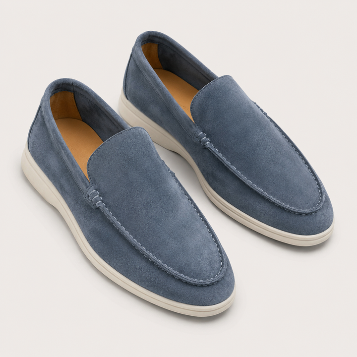 Men's slip-on loafers with rounded toes, stitched apron trim and flat light soles