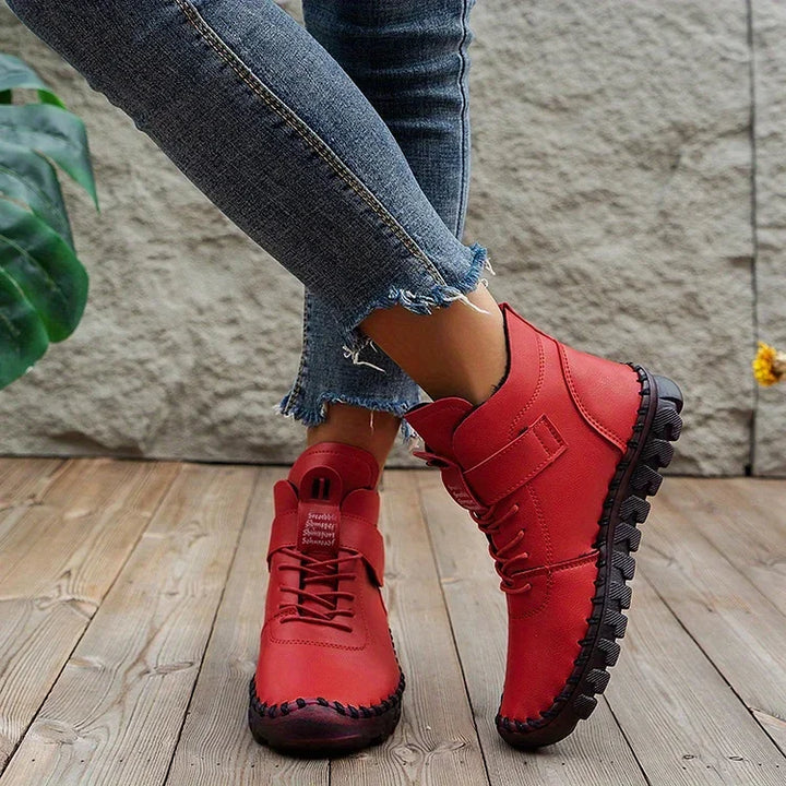 Women's lace-up combat ankle boots with chunky textured soles