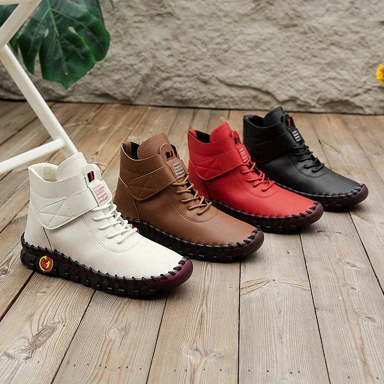 Women's lace-up combat ankle boots with chunky textured soles