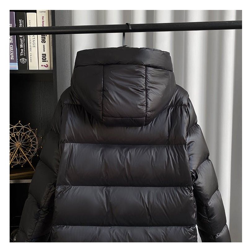 Women's black longline hooded puffer jacket with horizontal quilting