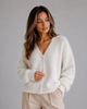 Women's textured V-neck button front cardigan with long sleeves