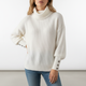 Women's ribbed turtleneck jumper with long sleeves and button cuff details