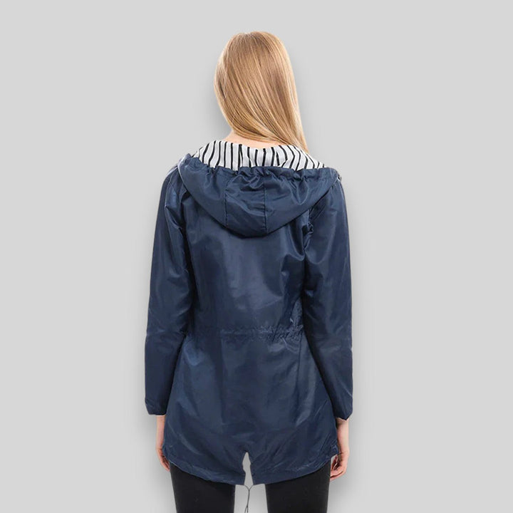 Women's hooded rain jacket with long sleeves, front zippers and striped lining