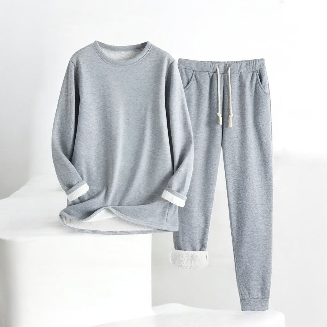 Women's two-piece lounge set with long-sleeve crew neck top and drawstring trousers