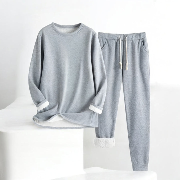 Women's two-piece lounge set with long-sleeve crew neck top and drawstring trousers