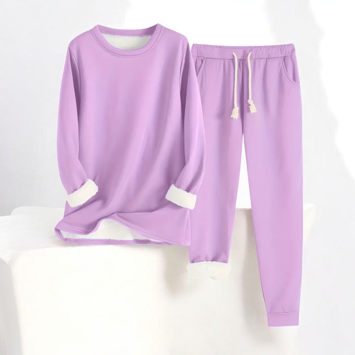 Women's two-piece lounge set with long-sleeve crew neck top and drawstring trousers