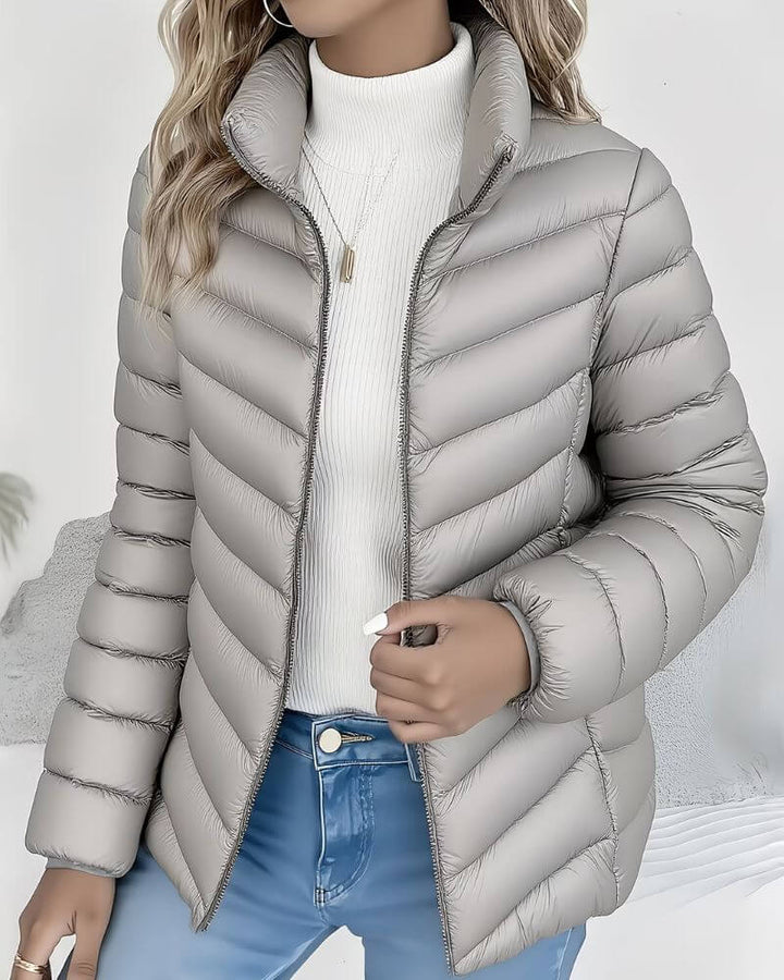 Women's quilted puffer jacket with stand collar and zip front