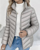Women's quilted puffer jacket with stand collar and zip front