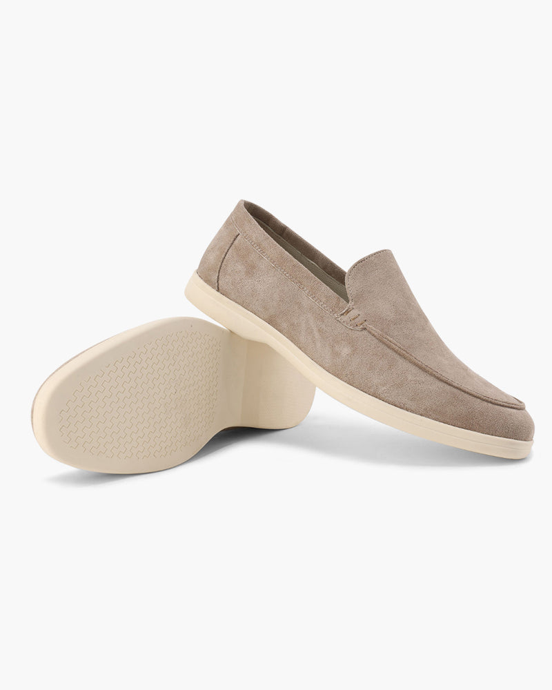 Unisex slip-on loafers with moc toe and raised wedge sole