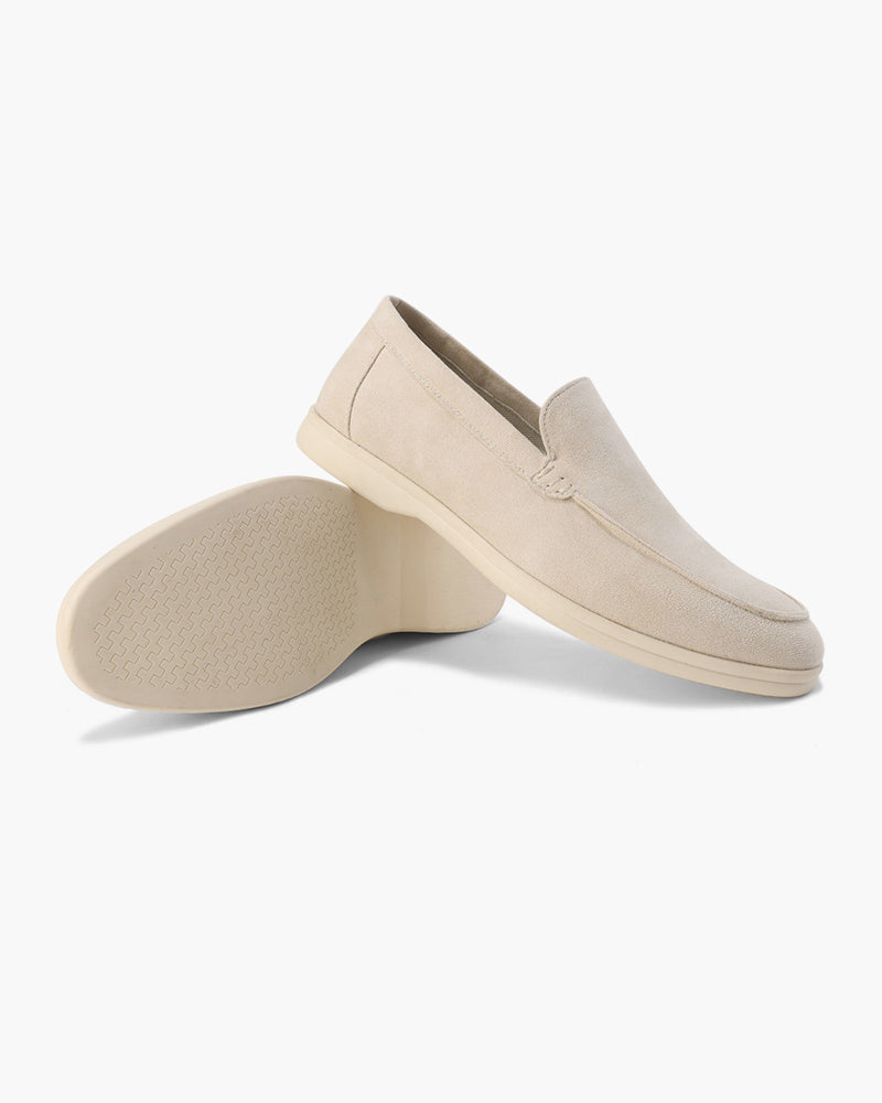 Unisex slip-on loafers with moc toe and raised wedge sole