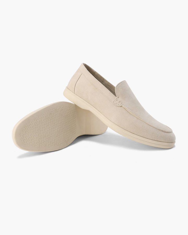 Unisex slip-on loafers with moc toe and raised wedge sole