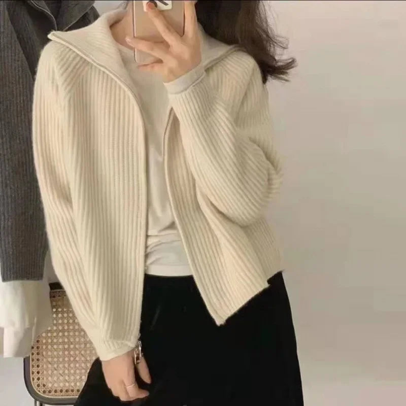 Women's zip-up knitted cardigan with high collar and long sleeves