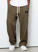 Wide leg trousers with adjustable drawstring waist and textured finish