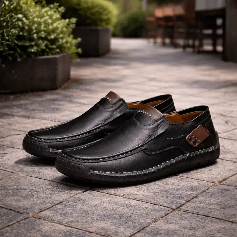 Men's slip-on moc toe loafers with stitched detailing and flat soles