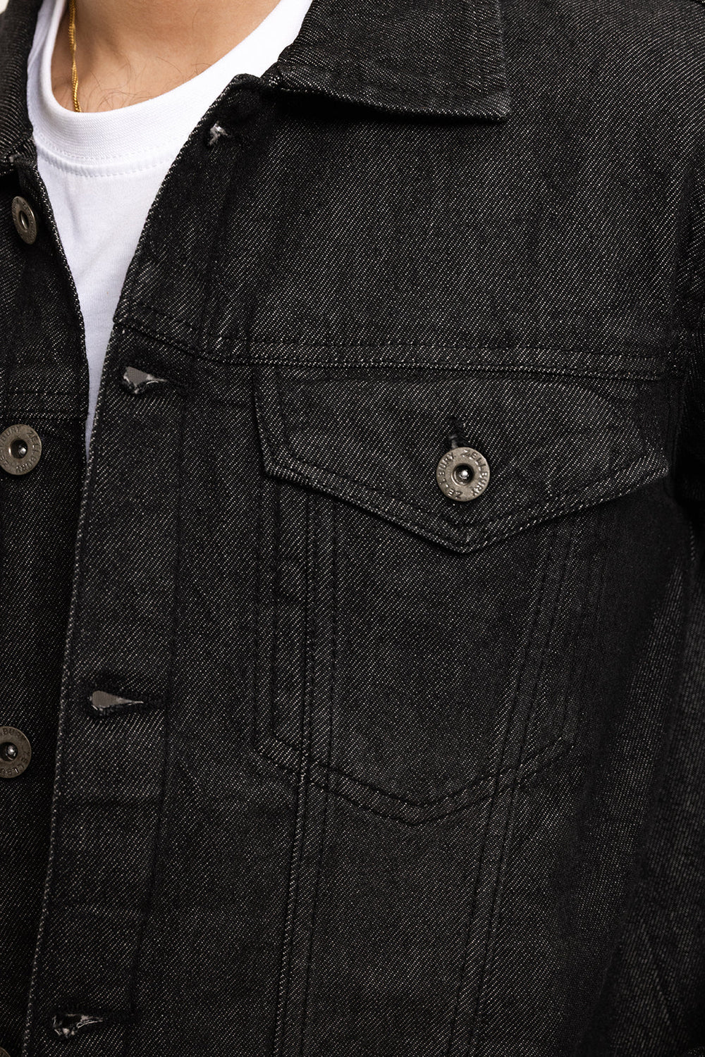 Men's black button-front denim jacket with pointed collar and chest pockets