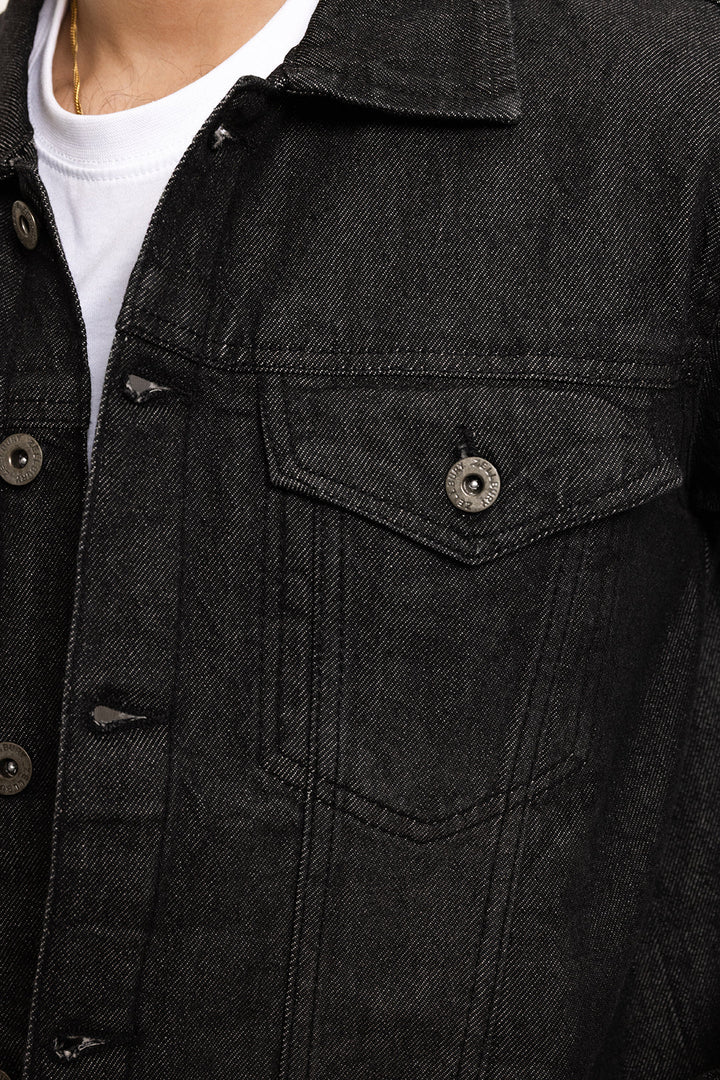 Men's black button-front denim jacket with pointed collar and chest pockets