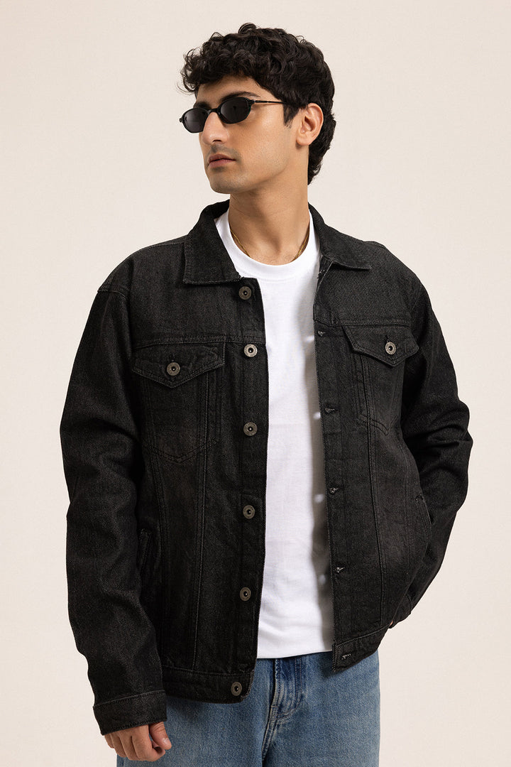 Men's black button-front denim jacket with pointed collar and chest pockets