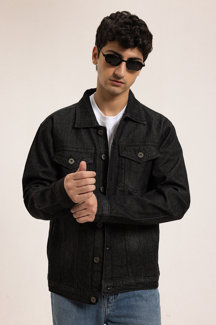 Men's black button-front denim jacket with pointed collar and chest pockets