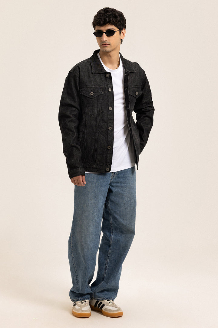 Men's black button-front denim jacket with pointed collar and chest pockets