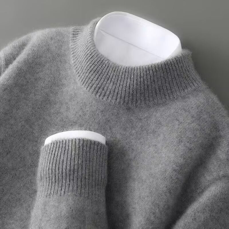 Plain crew neck jumper with long sleeves and ribbed collar and cuffs