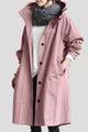 Women's long hooded button-front trench coat with angled pockets