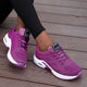 Women's low-top lace-up sneakers with perforated panels and air cushion-style soles