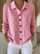 Women's button-front collared cardigan with long sleeves