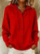 Women's hooded button-front hoodie with long sleeves and ribbed trim